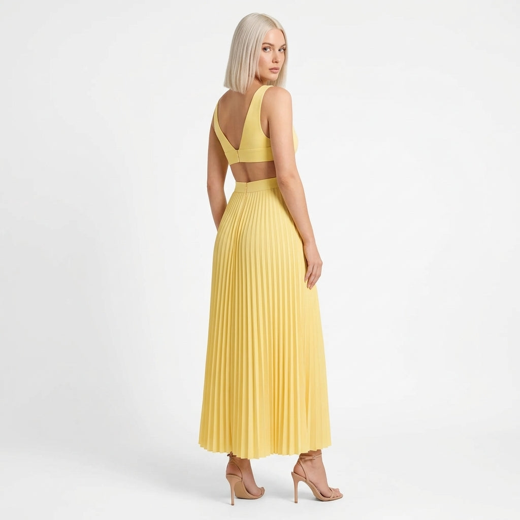 Clara-Jane pleated maxi dress with V-neck and waist cutouts