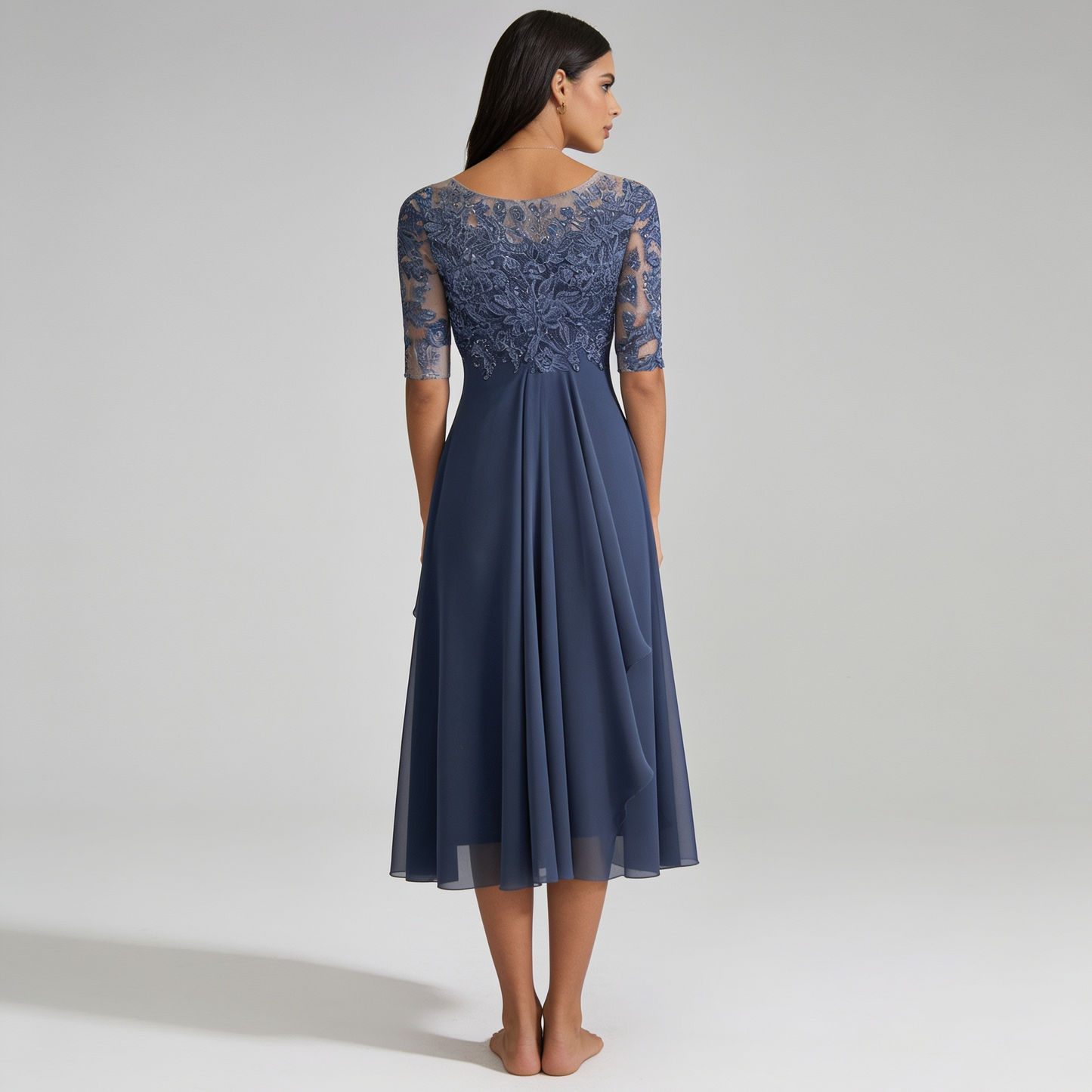 Elegant Sleeveless Dress with Tailored Waist and Flowing Silhouette