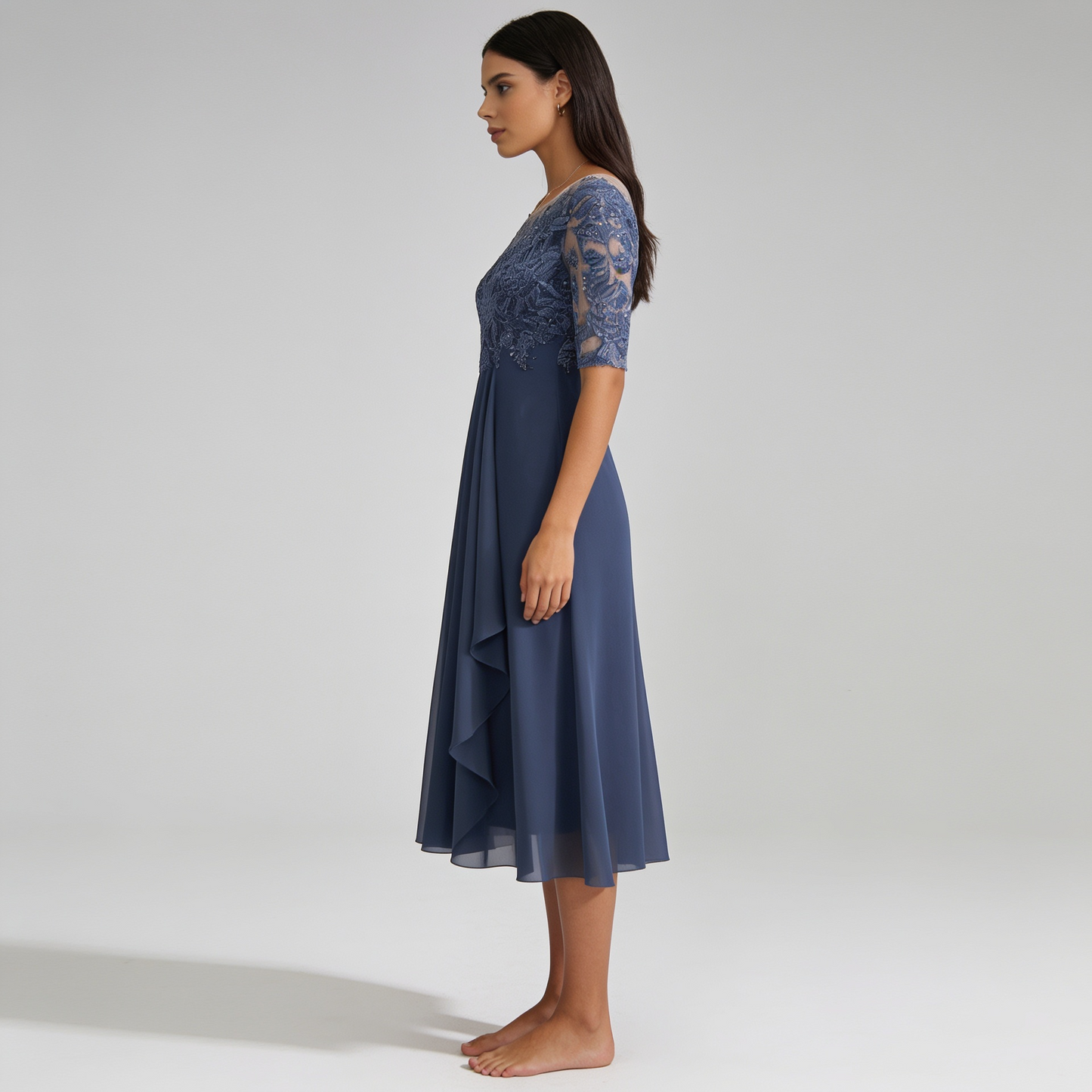 Elegant Sleeveless Dress with Tailored Waist and Flowing Silhouette